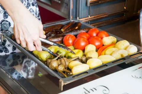 Vegetable stew raw iron rustic pan on wooden hundred. concept of delicious and Stock Photos
