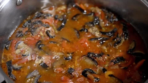 Vegetable Stew Simmering In Pot With Eggplant And Tomato Sauce Stock-Footage 330119278