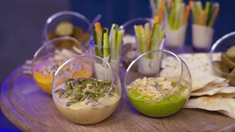 Vegetable Sticks with Dips and Appetizers on Buffet Table Video stock 314853908