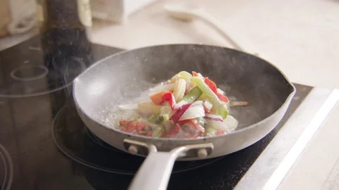 Vegetable Stiry Fry in Pan Steaming 60fps Stock Footage 189503104