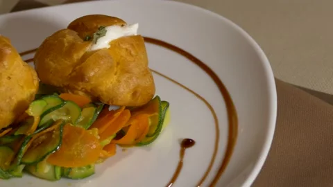Vegetable stuffed bignet with courgettes zucchini and carrots Video stock 138895428