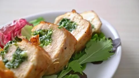 Vegetable sushi rolls served on a white plate with greens Stock Photos