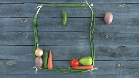 Vegetable Tetris on the old village table. Video stock 80141438
