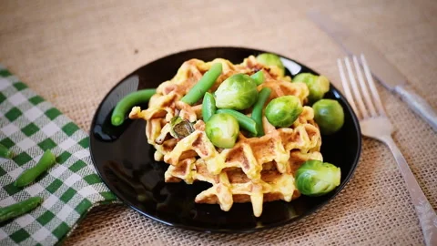 Vegetable waffles with Brussel sprouts and green beans Stock Footage 303824023