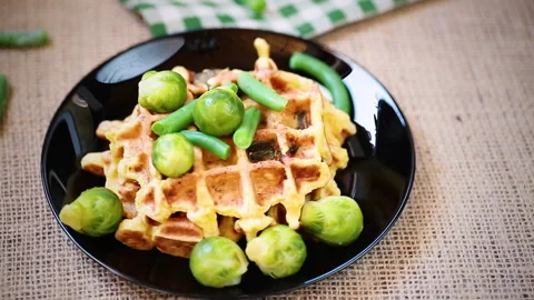 Vegetable waffles with Brussel sprouts and green beans Stock Footage 306860285