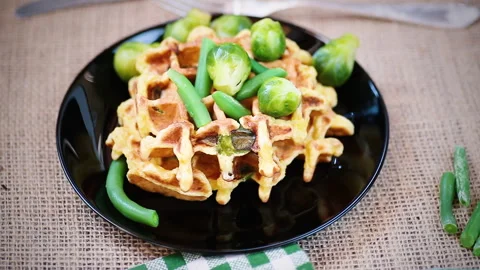 Vegetable waffles with Brussel sprouts and green beans. Stock Footage 310092986