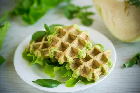 Vegetable waffles cooked with herbs in a plate Stock Photos