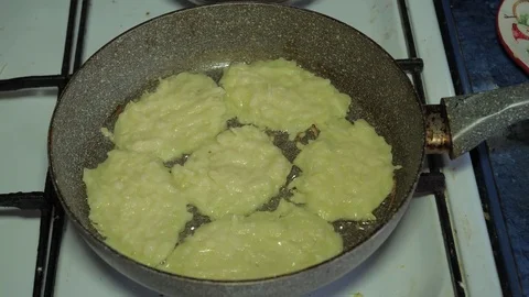 Vegetable Zucchini Pancakes Are Fried In A Pan Stock Footage 80191636