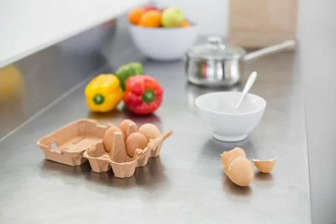Vegetables and eggs lying on the work surface Stock Photos