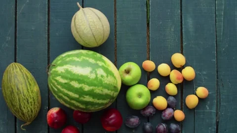 Vegetables and Fruit Stop Motion Animation on Rustic Green Wooden Table Stock Footage 331101331