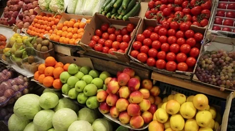 Vegetables and fruits on the shelves of the market Stock Footage 59336281
