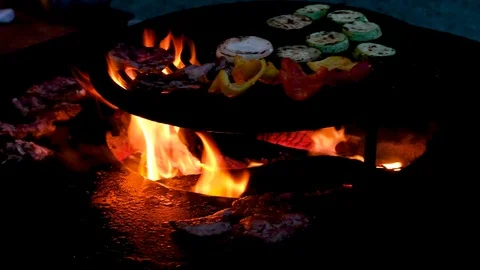 Vegetables and meat are fried on the grill Stock Footage 113560171