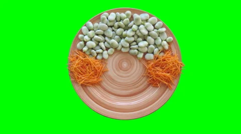 Vegetables appears on a Plate stop motion animation on green screen. Chroma key Stock Footage 68675198