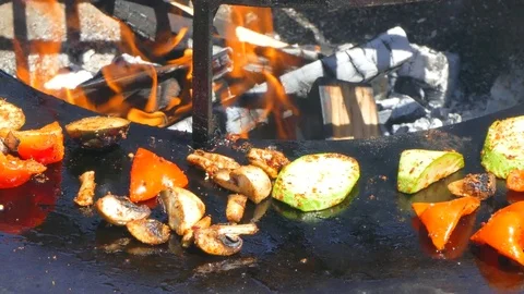 Vegetables are fried on fire Video stock 85387180