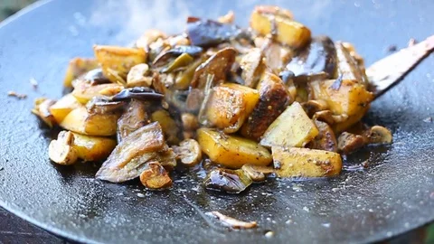 Vegetables are grilled in a pan. Stock Footage 118450943
