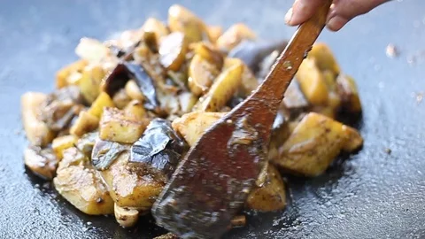Vegetables are grilled in a pan. Stock Footage 118451590