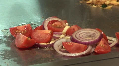 Vegetables are roasted on a cooking palate Video stock 67262964