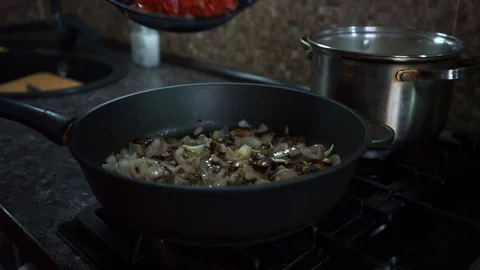 Vegetables are stewed in a pan Stock Footage 128307504