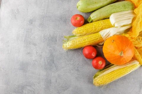 Vegetables background corn, tomatoes, zucchini Stock Photos
