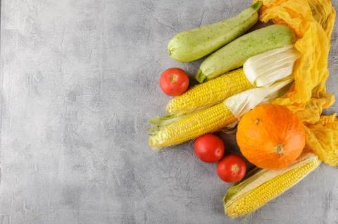 Vegetables background corn, tomatoes, zucchini Stock Photos