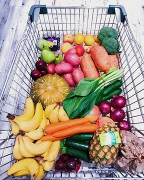 Vegetables in a basket Stock Photos