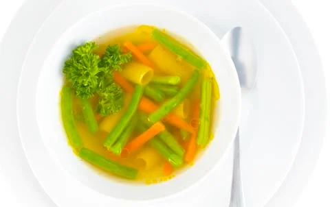 Vegetables bean soup on white background Stock-Fotos