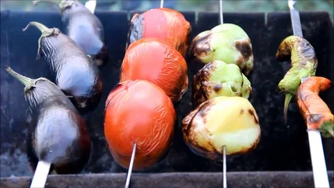 Vegetables being cooked on skewers Stock Footage 77862186