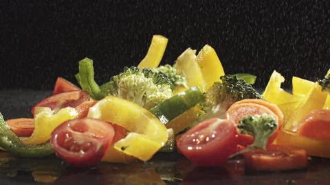 Vegetables on black background Stock Footage 135642751