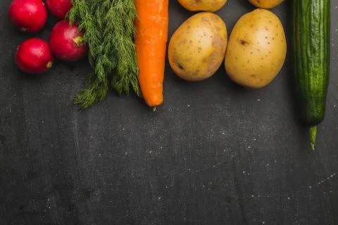 Vegetables on a black background Stock Photos