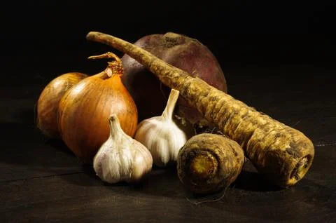 Vegetables on the black background Stock Photos