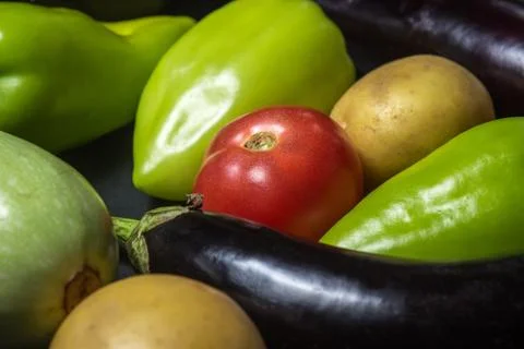 Vegetables on a black background.  Stock Photos