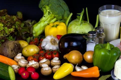 Vegetables  on a black background, top view Stock Photos