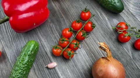 Vegetables on a black wooden background. Stock Footage 149756822