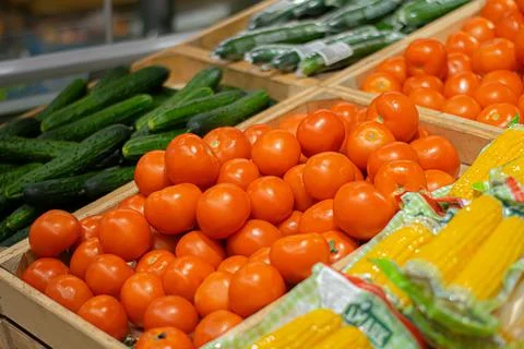 Vegetables in boxes in stores Stock Photos