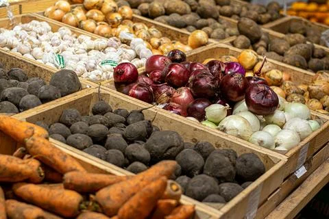 Vegetables in boxes in stores Stock Photos