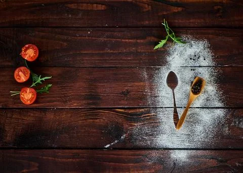 Vegetables on the brown kitchen table Stock Photos
