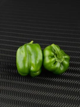Vegetables ; capsicum on black waves background Stock-Fotos