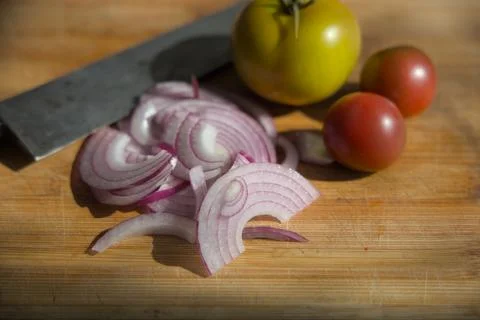 Vegetables on a chopping board. Stock Photos