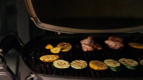 Vegetables cooking on the barbeque Stock Footage 41984056