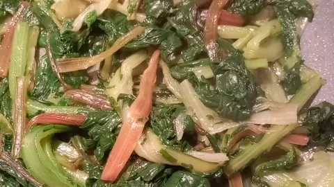 Vegetables cooking in the frying pan Video stock 262772059