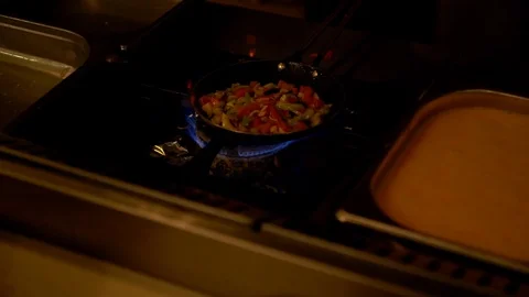 Vegetables cooking in a pan for an egg omelette Stock Footage 108112475