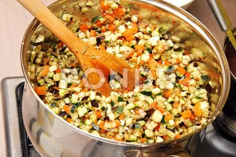 Vegetables Cooking In A Pan On Stove
