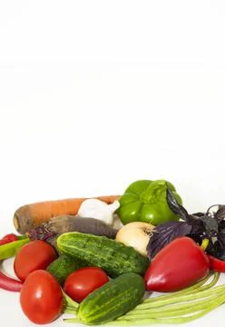 Vegetables cucumbers, tomatoes, beets, on a white background Stock Photos