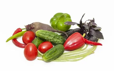 Vegetables cucumbers, tomatoes, beets, on a white background Stock Photos