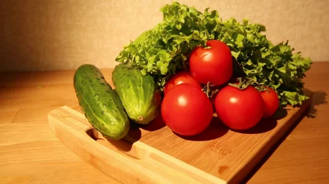 Vegetables on cutting board Stock Footage 50362541