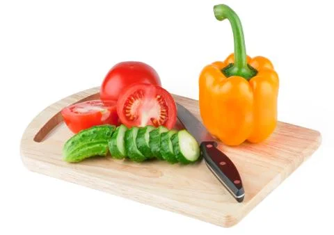 Vegetables on cutting board Stock Photos