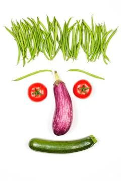 Vegetables face Stock Photos