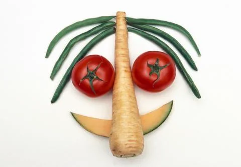 Vegetables faces Stock Photos