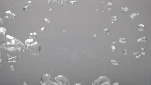 Vegetables fall into boiling water, slow motion. Cooking soup. Stockbeeldmateriaal 124309224