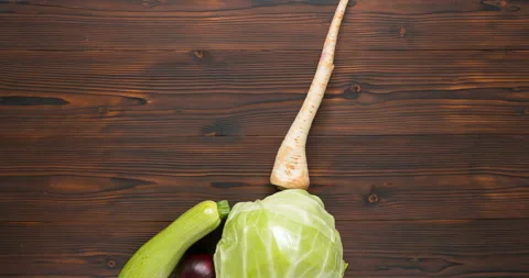 Vegetables fall forming a mountain Stock Footage 127788273
